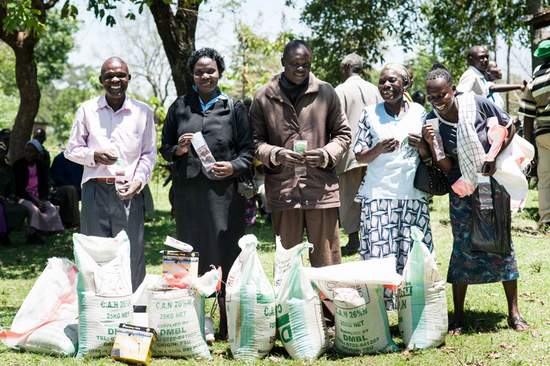 Farmers with Fertilizer bags